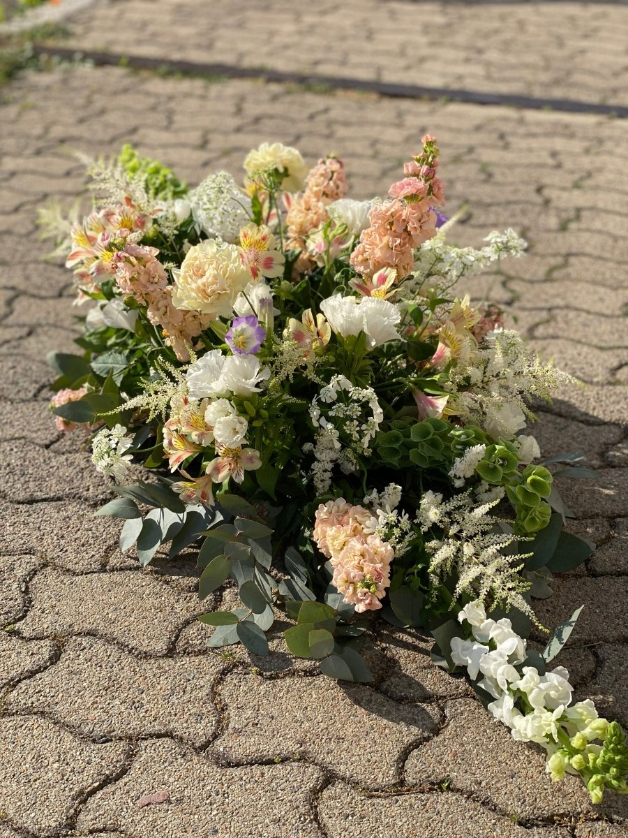 La raquette de deuil - Les jolies fleurs